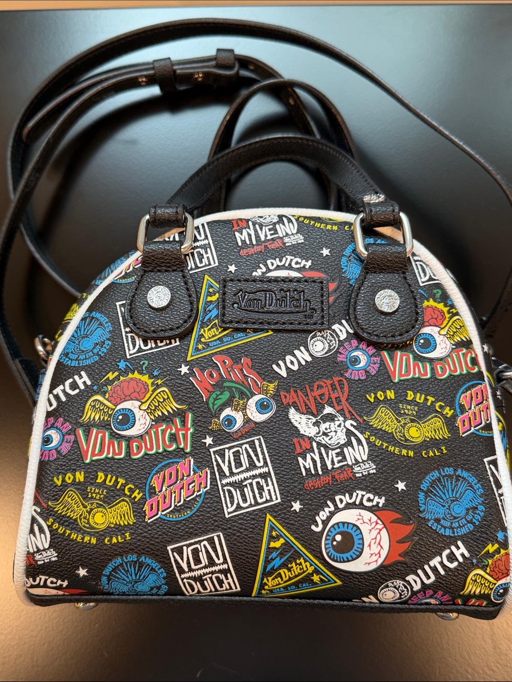 Von Dutch Black Multi-Logo Dome Crossbody with Colorful Graphic Print